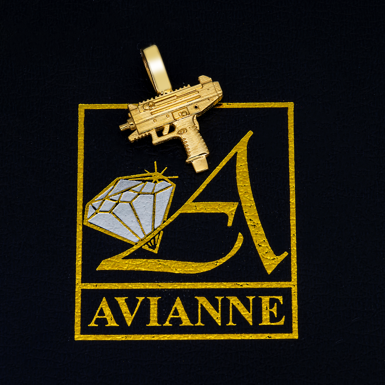 14k yellow gold uzi pendant